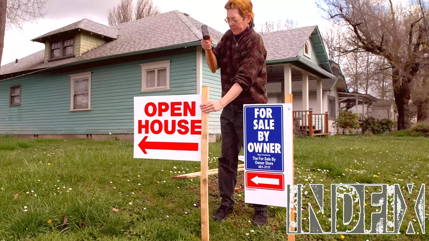 Mortgage rates edge lower, hover near 6%