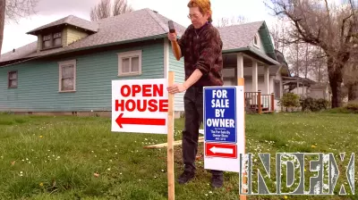 Mortgage rates edge lower, hover near 6%